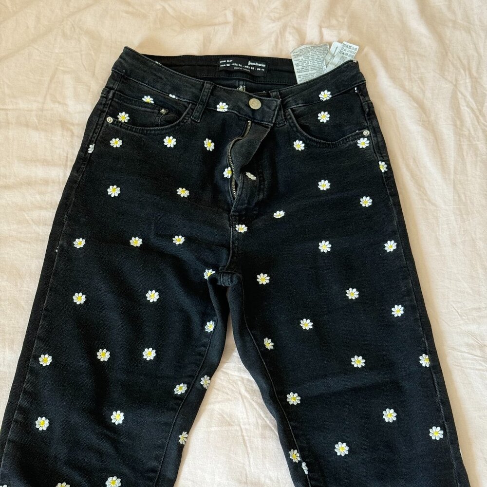 Stradivarius daisy-embroidered black jeans